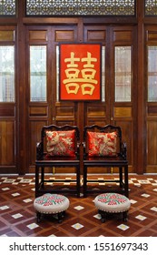 Beautiful oriental style wedding tea ceremony room setting and the classic Chinese background with the Chinese Words 'Double Happiness' for love and wedding.