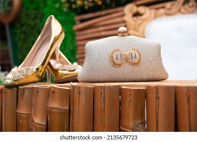 A beautiful ornaments of an Igbo bride on her traditional wedding day. From the neck beads to the hand beads, to the wonderful pair of shoes and a purse 
