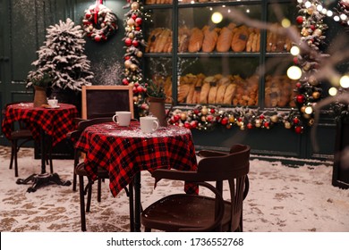 Beautiful outdoor cafe with festive decoration. Christmas celebration - Powered by Shutterstock