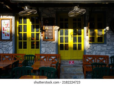 Beautiful Outdoor Cafe View With Yellow Doors, Direct Sunlight Comes, No People, Cafe Outside View, Kas Streets, Antalya, Turkey, June 2022.