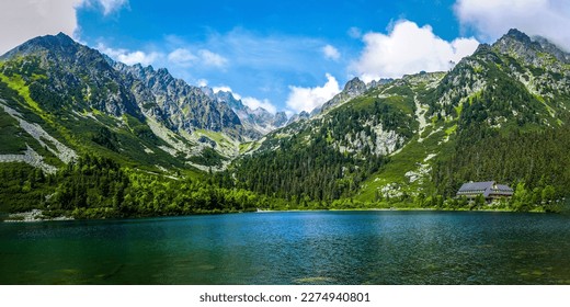 Beautiful panorama of a mountain lake. Mountain lake panorama. Beautiful mountain lake panoramic landscape. Mountain lake panoramic landscape - Powered by Shutterstock