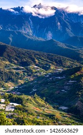 Beautiful Panorama View Of Rocky Mountain Range Mount Kinabalu With Tropical Landscape During Morning With Homestay Native Village At Kundasang Sabah Malaysia.