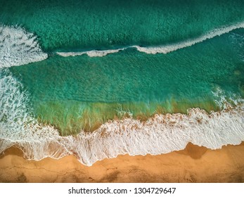 Beautiful Panoramic Birds Eye View On Ocean Waves, Fuerteventura Island. Aerial Shooting Seascape Coastline At Sunny Day. Travell, Beach,islands, Nature, Freedom Concept.