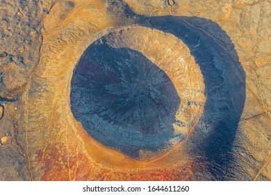 Beautiful panoramic birds eye view on Calderon Hondo, Fuerteventura island. Aerial shooting vulcano around mountains with ocean coastline at sunny day. Travell, Mountains,islands, nature, concept. - Powered by Shutterstock