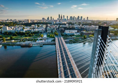 Beautiful Panoramic Drone View Of The Centre Of Modern Warsaw With Silhouettes Of Skyscrapers In The Sunset. View From The Area Of Świętokrzyski Bridge