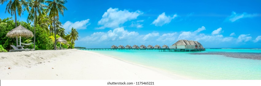 Beautiful panoramic landscape of over water villas, Maldives island, Indian Ocean - Shutterstock ID 1175465221
