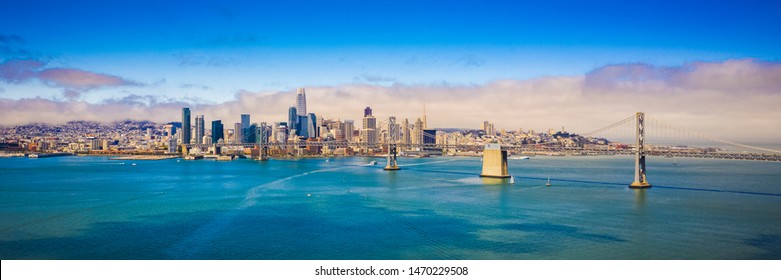 Beautiful Panoramic San Francisco Skyline , The Bay Bridge And The Famous Fog