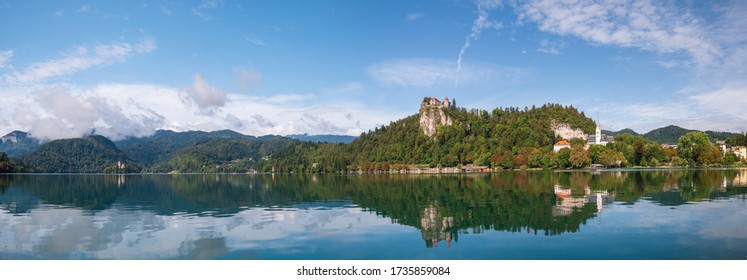 Beautiful panoramic view of lake Bled landscape with the Castle of Bled and Church of Saint Martin. Bled Castle is a medieval castle built on precipice above the city of Bled in northwestern Slovenia
