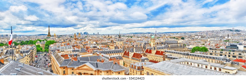 Beautiful panoramic view of Paris from the roof of the Pantheon. View of the Eiffel Tower and flag of France.