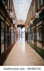 Beautiful Parisian shopping gallery - tilt-shift lens used to accent the path to the entrance and to emphasize the attention it