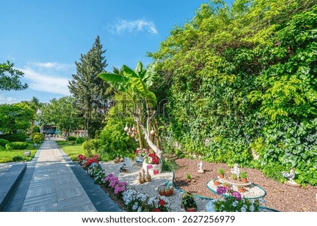 Beautiful park and garden decoration with dried water pumpkins 