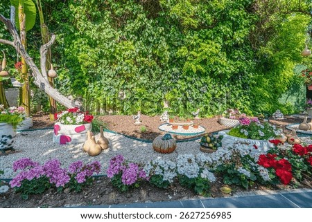 Beautiful park and garden decoration with dried water pumpkins 