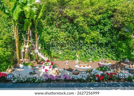 Beautiful park and garden decoration with dried water pumpkins 