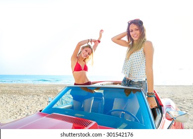 Beautiful party friend girls dancing in a car on the beach happy - Powered by Shutterstock