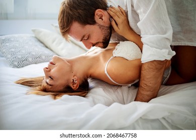 Beautiful Passionate Couple Having Sex On The Bed.
