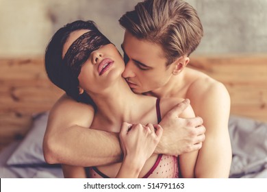 Beautiful Passionate Couple Is Having Sex On Bed