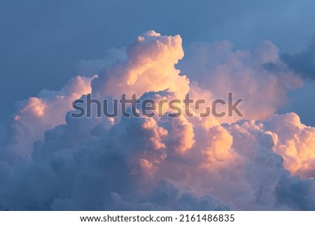 Beautiful pastel color of the cumulus cloud during sunset