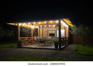 Beautiful patio zone near the house for relaxing ang grilling food. Warm night lamps decoration for atmosphere.