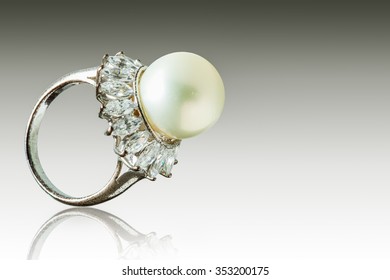 Beautiful Pearl Ring Isolated On Gray