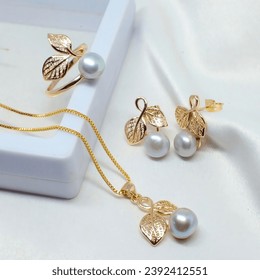 Beautiful pearl ring, necklace, and earring - Powered by Shutterstock