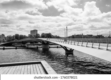 Beautiful Pedestrian, Bicycle Bridge Over The Canal. Denmark. Copenhagen.Black And White Photo. Architecture Sights