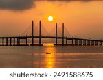 Beautiful Penang Bridge sunrise with boat view