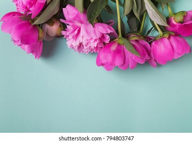 Beautiful Peonies On The Mint Color Background, Top View