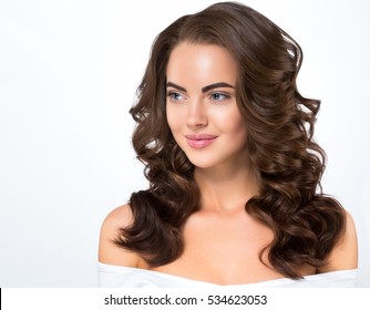 Beautiful people. Brunette woman girl with long shiny wavy hair. Beautiful model with curly hairstyle - Shutterstock ID 534623053
