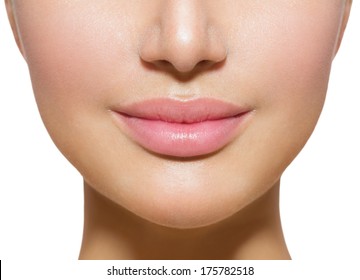 Beautiful Perfect Lips. Sexy Mouth close up. Beauty young woman Smile. Natural Plump full  Lip. Lips augmentation. Close up over white background 