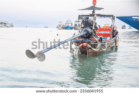 The beautiful photo of the very powerful Thai motor boats that tourists love.Selective focus in close-up propeller in detail