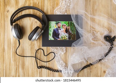 beautiful picture of bride and groom and headphones