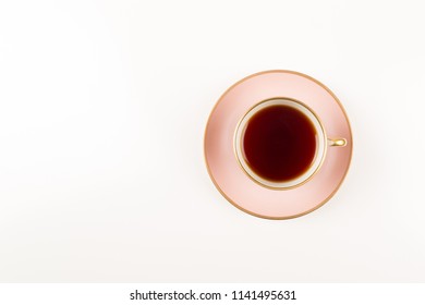 Beautiful Pink And Gold Cup Of Tea, Shot From Above, Isolated On White Background, Modern