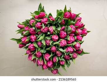 Beautiful Pink tulips heart shaped  bouquet of flowers for valentines day, mothers day, anniversary, get well soon gift, from holland, the Netherlands national flower roze tulpen wallpaper background - Shutterstock ID 2136189565