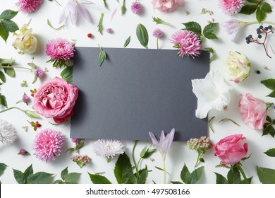 Beautiful pink and white flowers with empty notebook