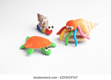 Beautiful plasticine animals on white background. Children's handmade ideas - Shutterstock ID 2293419767