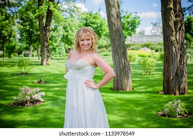 Beautiful Plus Size Bride At Park In Her Wedding. Wedding Concept