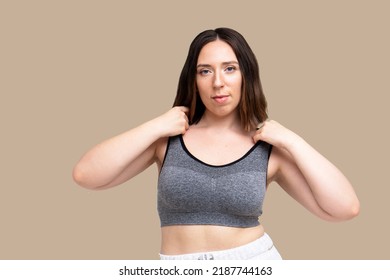 Beautiful Plus Size Model Smiling In Sport Outfit Yoga Outfit Isolated On Beige