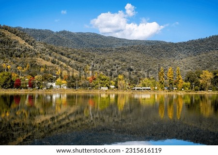 Beautiful pondage and reflections at Mount Beauty, Victoria, Australia. The Regulating Pondage is part of the Kiewa Hydroelectric Scheme. The town of Mount Beauty nestled at the foot of Mount Bogong