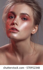 Beautiful Portrait Of A Girl With Wet Make-up And Shiny Skin