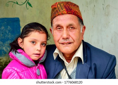 Beautiful Portrait Of Grand Father With His Grand Daughter In Darjeeling India- September 2019