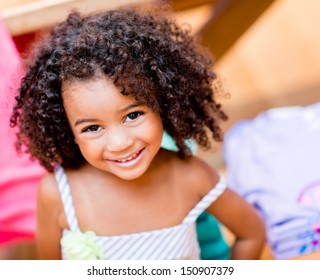 Beautiful Portrait Of A Happy Little Girl Smiling 