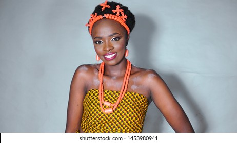 Beautiful portrait of Igbo woman dressed in traditional Nigerian attire  