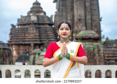 Beautiful Portrait of indian Girl wearing traditional clothes with greeting gesture. Incredible India. - Shutterstock ID 2179893257