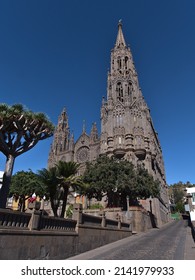 Beautiful Portrait View Of The Church Of San Juan Bautista In The Historic Center Of Town Arucas In The North Of Gran Canaria, Canary Islands, Spain On Sunny Day In Winter Season.