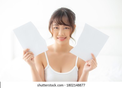 Beautiful Portrait Young Asian Woman Breaking Old Skin Face With Pores And Wrinkled On Photo Paper, Beauty Asia Girl With Treatment Cosmetic, Female Makeup Problem, Health And Wellness Concept.