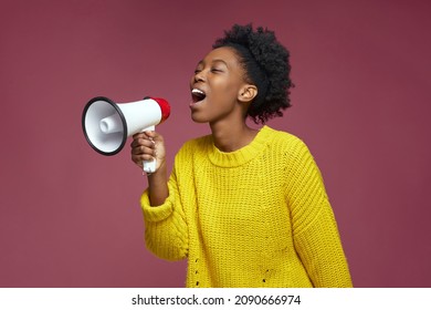 Beautiful Positive Happy African American Girl Scream In Megaphone. Black Girl Yell In Loudspeaker Announcing Discounts