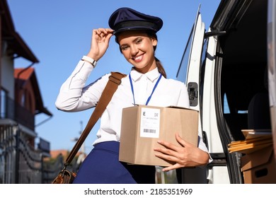 Beautiful Postwoman With Parcel Near Car