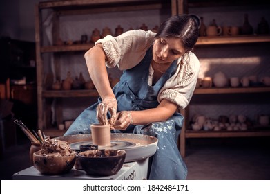 Beautiful Pottery Master Is Working On Pottery Wheel. Pottery Workshop.