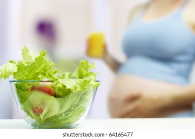 A Beautiful Pregnancy Woman Eating Healthy Food