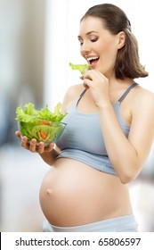 A Beautiful Pregnancy Woman Eating Healthy Food